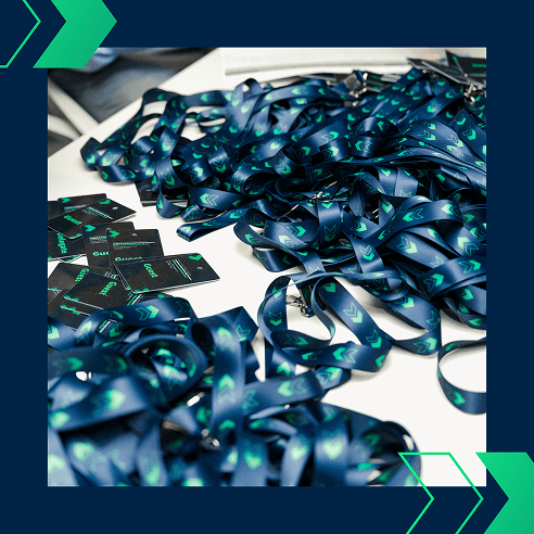 Piles of branded lanyards and name tags for attendees at the Jayesh Logistics Conclave on November 18, 2024.