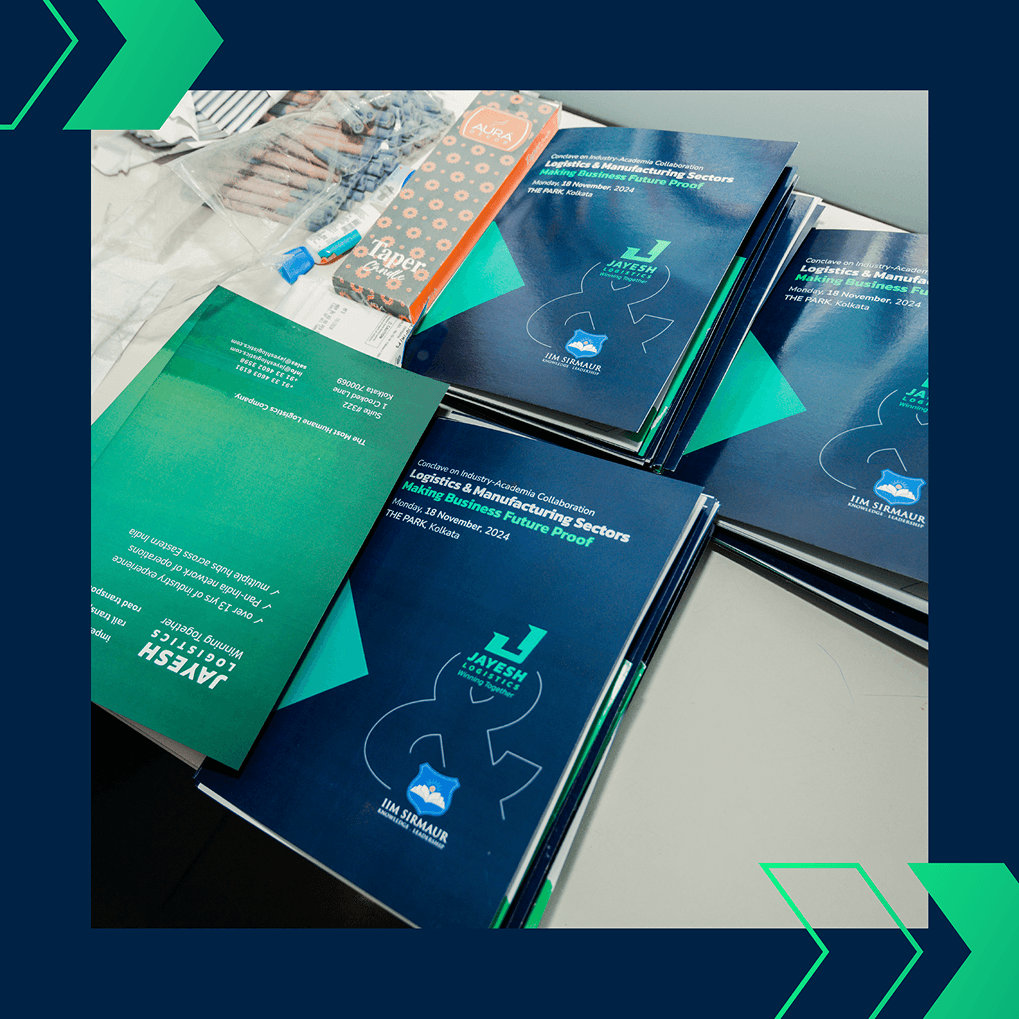 Branded event folders and brochures from the Jayesh Logistics Conclave, highlighting collaboration with IIM Sirmaur, November 18, 2024.