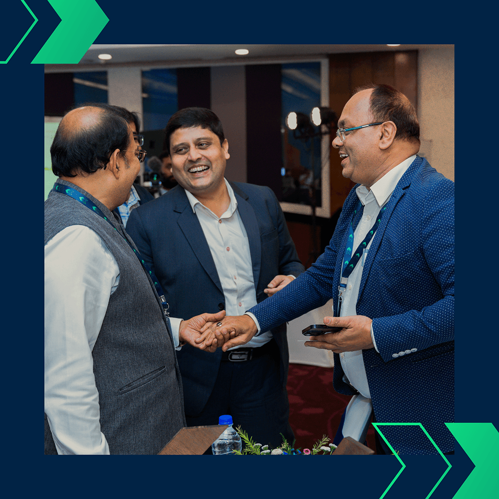 Tasleem Arif shaking hands with another delegate during a networking session at the Jayesh Logistics Conclave, November 18, 2024.